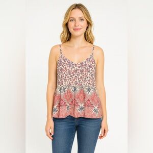 Maurice’s boho top with spaghetti straps, gathered back and peplum bottom. E4